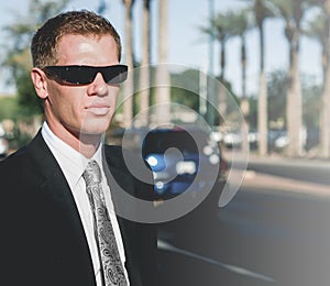 Man wearing suit and sunglasses outdoor in Los Angeles