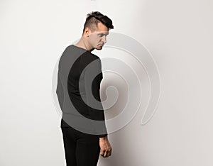 Man wearing thermal underwear on grey background. Space for text