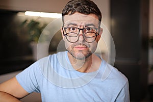 Man wearing three different types of eyeglasses simultaneously photo