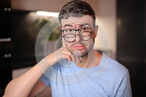 Man wearing three different types of eyeglasses simultaneously photo