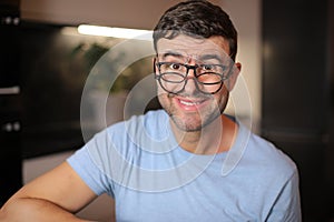 Man wearing three different types of eyeglasses simultaneously photo