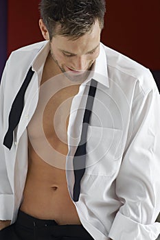 Man Wearing An Unbuttoned Shirt