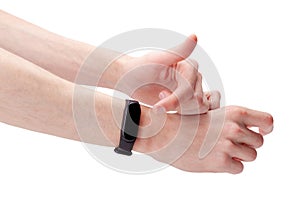 Man wearing, using a smart band, smartwatch, fitness sport activity tracker watch accessory pointing at the empty blank display