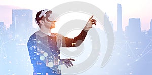 Man wearing a VR headset interacts with a virtual interface, cityscape background