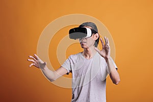 Man wearing vr headset playing virtual reality games