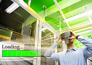 Man wearing VR Virtual Reality Headset with Loading Interface and servers