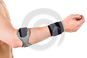 Man Wearing Wrist and Elbow Braces in Studio