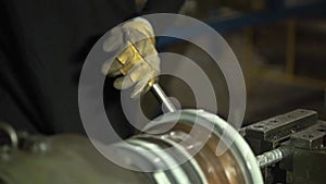 Man Wearing Yellow Gloves Cutting Rebar - Reinforcement Steel Bar - Side Angle