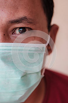 Man wears medical face mask to anticipate covid-19