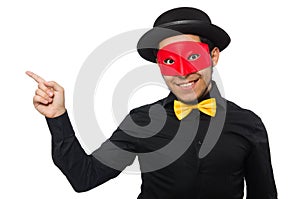 A man wears red mask on white
