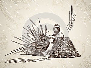 Man weaves a basket of bamboo