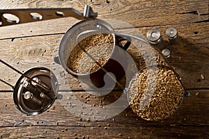 Man Weighs Malt for Home Brewing of Beer. photo