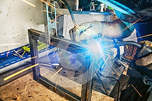 Man weld a metal welding machine