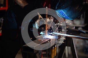 man welder, mig or tig welding, craftsman, erecting technical steel Industrial, steel welder in factory technical