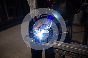 man welder, mig or tig welding, craftsman, erecting technical steel Industrial, steel welder in factory technical