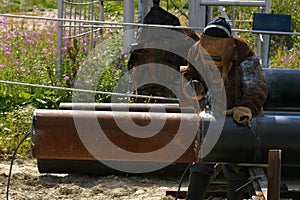 Man welding the pipe
