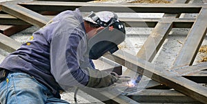 Man welding a structure