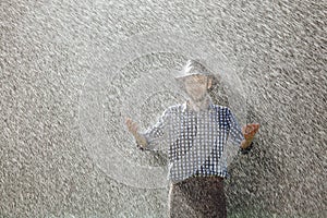 Man wet under rain farmer hat enjoy prayer happy upset heavy wet