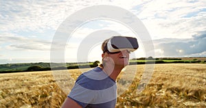 Man, wheat field and glasses for virtual reality in nature, holiday or adventure in metaverse with smile. Young guy, ar