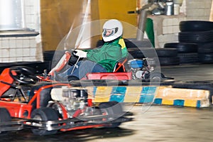 The man at the wheel go-cart racing on training