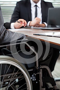 Man on wheelchair during conversation