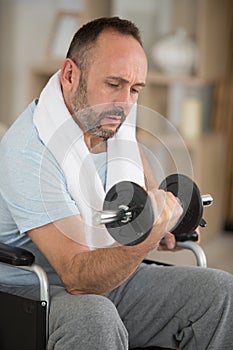 man in wheelchair doing sports