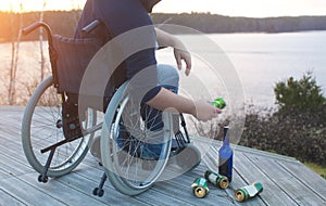 Man in a wheelchair drinking alcohol