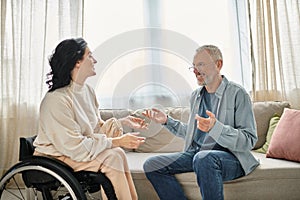 A man in a wheelchair engages