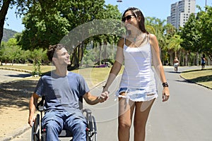 Man in wheelchair and girlfriend