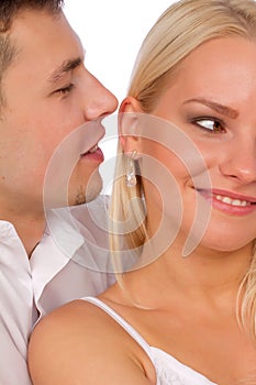 Man whisper a compliment photo