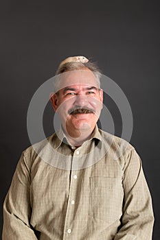 Man with a white baby rat