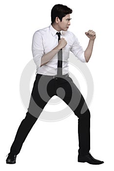 Man in white shirt doing fighting stance