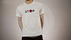 Man white t-shirt print stop corona virus concept quarantine