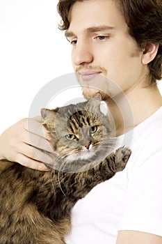 Man who keeps on hand fluffy cat