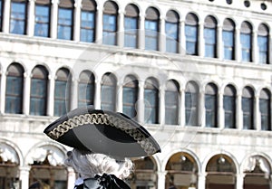 man with wig and antique hat in Piazza San Marco in Venice