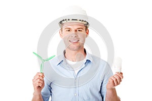 Man with a wind turbine and a light bulb.