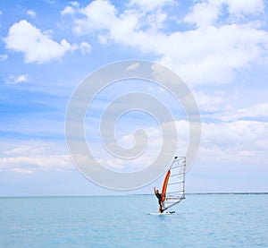 A man on a windsurf photo