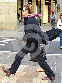 Man on a Windy Street