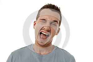 man winking looking at the camera on white background