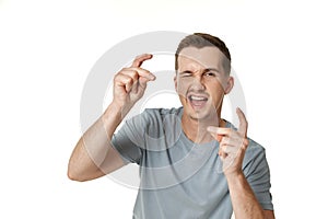 man winking looking at the camera on white background
