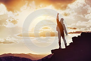 Man winner mountain top silhouette photo