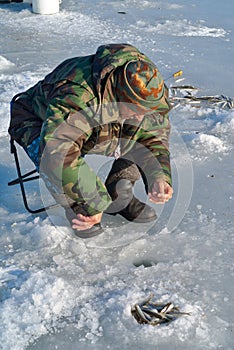 Man on winter fishing 33