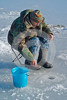 Man on winter fishing 37