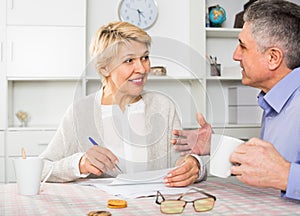 Man and woman 50-54 years old are lead discussion