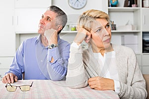 Man and woman 50-54 years old are offended at each other