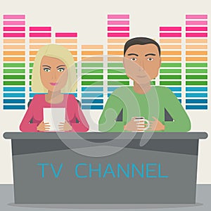 A man and a woman are anchors on the telecast in the studio. TV show with 2 anchor mans on tv channel.