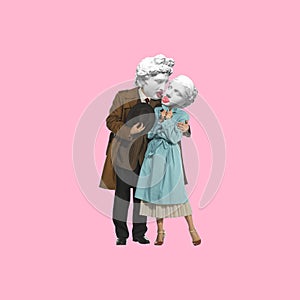 Man and woman with antique statue head hugging, going on romantic date. Contemporary art collage.