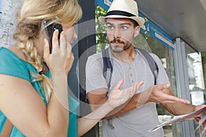 man and woman argue where to go