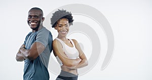 Man, woman and arms crossed for fitness in studio, training partnership and face by space by white background. African