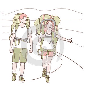 Man and woman with backpacks catching transport for traveling